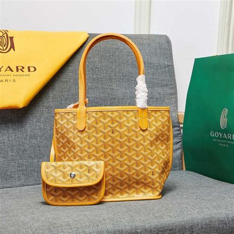 yellow goyard bucket bag